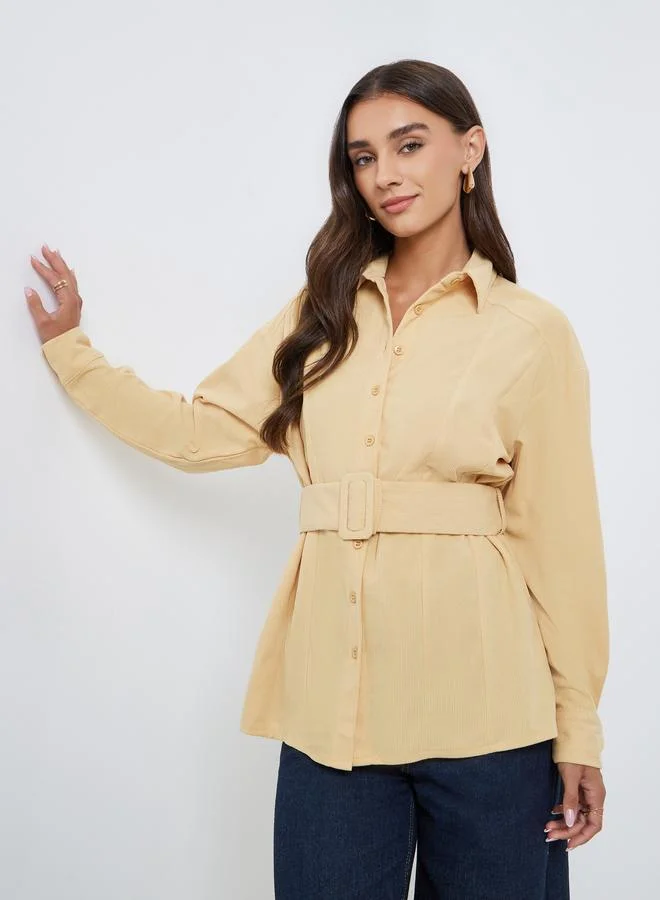 ستايلي بلوزة كوردروي طويلة مع حزام