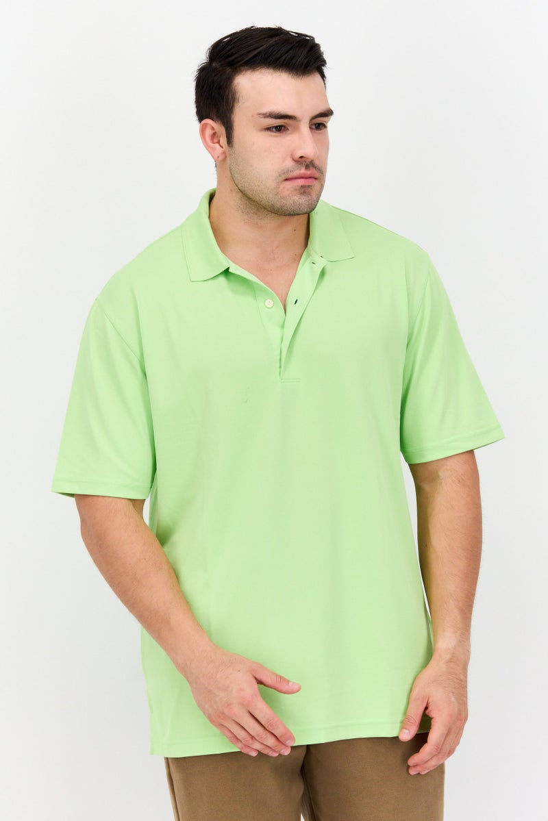 Greg Norman تي شيرت بولو للرجال بقصة عادية بأكمام قصيرة، لون ليموني - Image 1