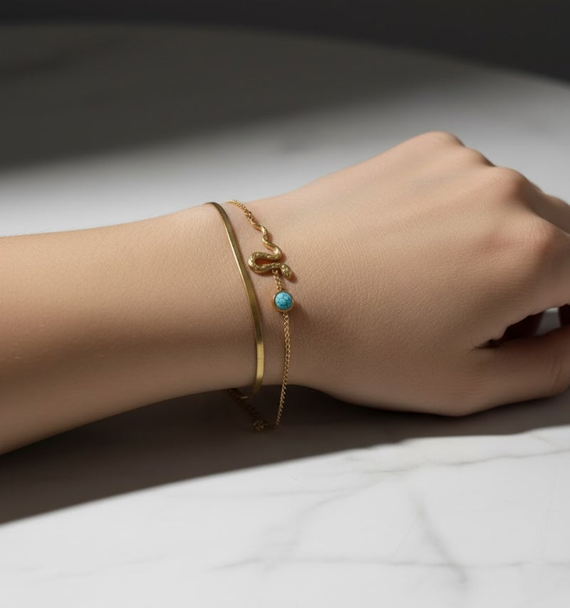 FLUFFY Women’s Bracelet, Snake Design with Turquoise Bead - Image 1