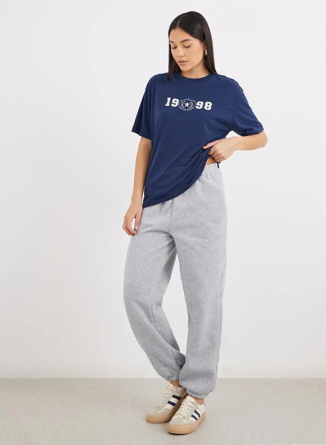 ستايلي Styli Women Navy Blue 1998 Graphic Print Short Sleeve Oversized T-Shirt