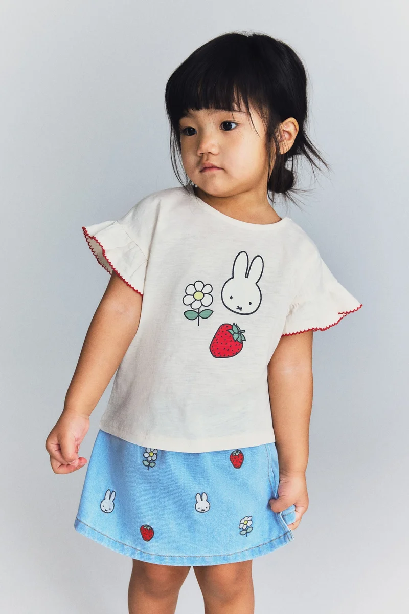 اتش اند ام بلوزة من القطن مزيّنة بطبعة