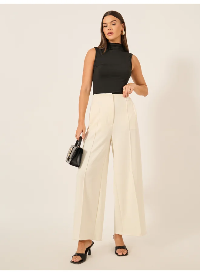 Styli Styli Solid Sleeveless High Neck Top