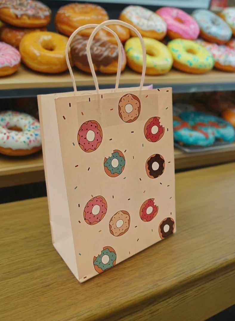 كيس ورقي بيج برسومات دونات، كيس هدايا متوسط الحجم و متعدد الاستخدامات، مناسب للاستخدام في الدراسة و العمل و التسوق 27x21 سم. - Image 3