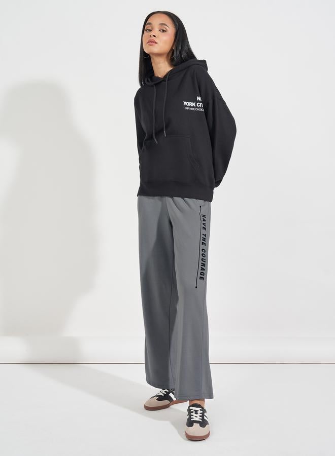 Styli Slogan Print High Rise Wide Leg Joggers  - Image 1
