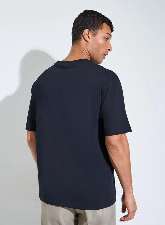 Styli  Black HD Slogan Print Crew Neck Oversized T-Shirt for Men | Best Price UAE