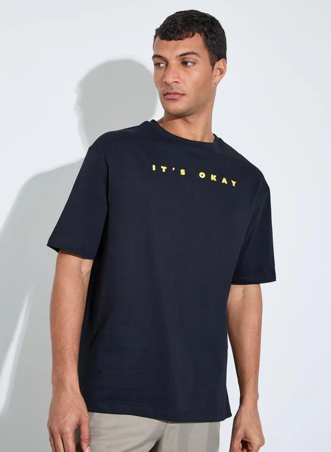 Styli  Black HD Slogan Print Crew Neck Oversized T-Shirt for Men | Best Price UAE