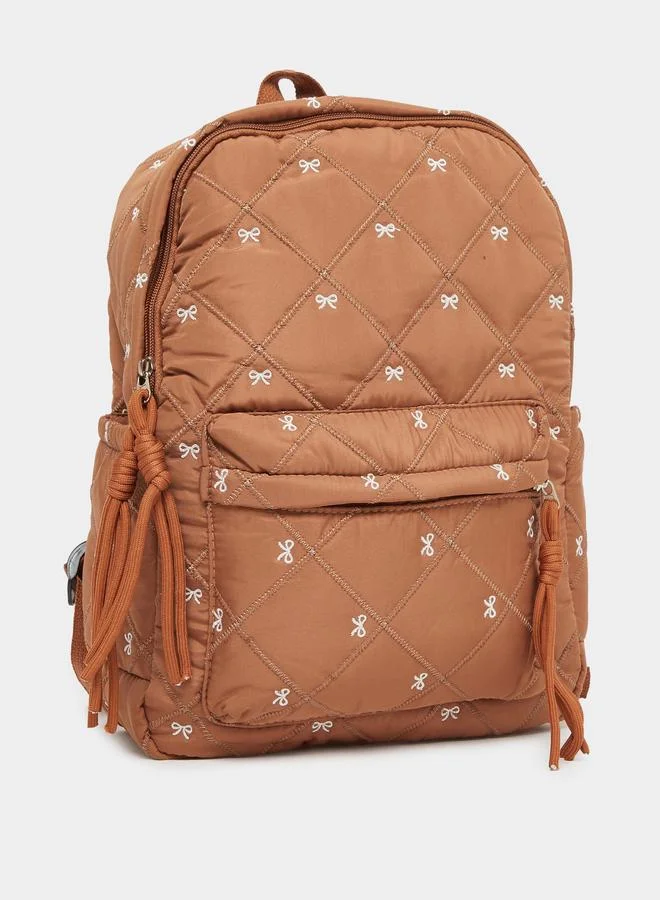 Women Tan Quilted Look Backpack with Bow Detail