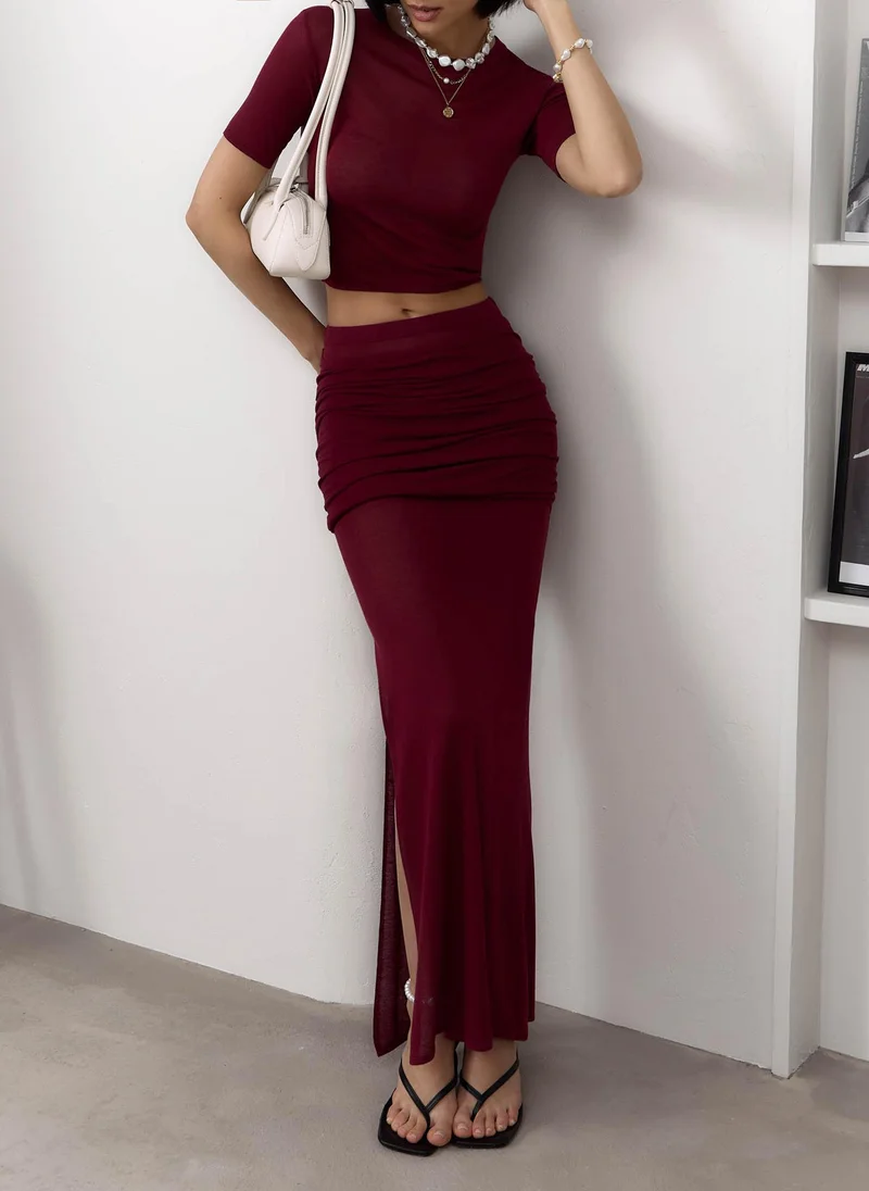 Lichi Jersey midi skirt with draped hips
