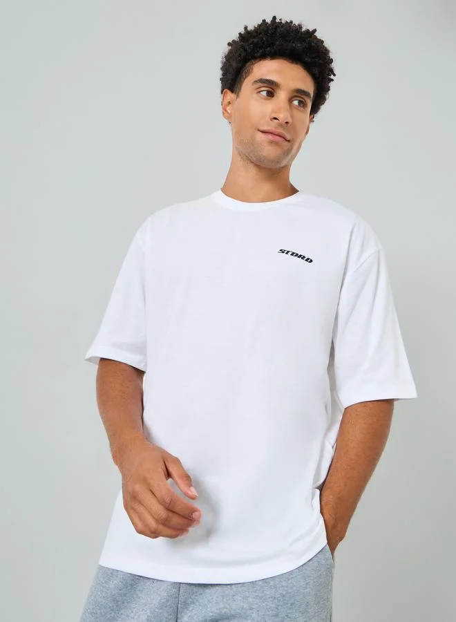 Styli Men White Graphic Print Oversized T-Shirt