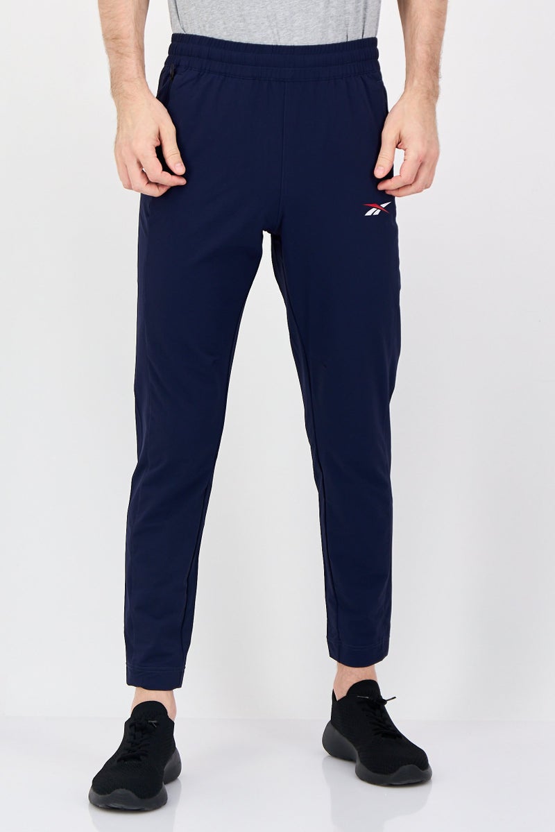 Reebok Men Sportswear Fit Training Track Pants, Navye - Image 1