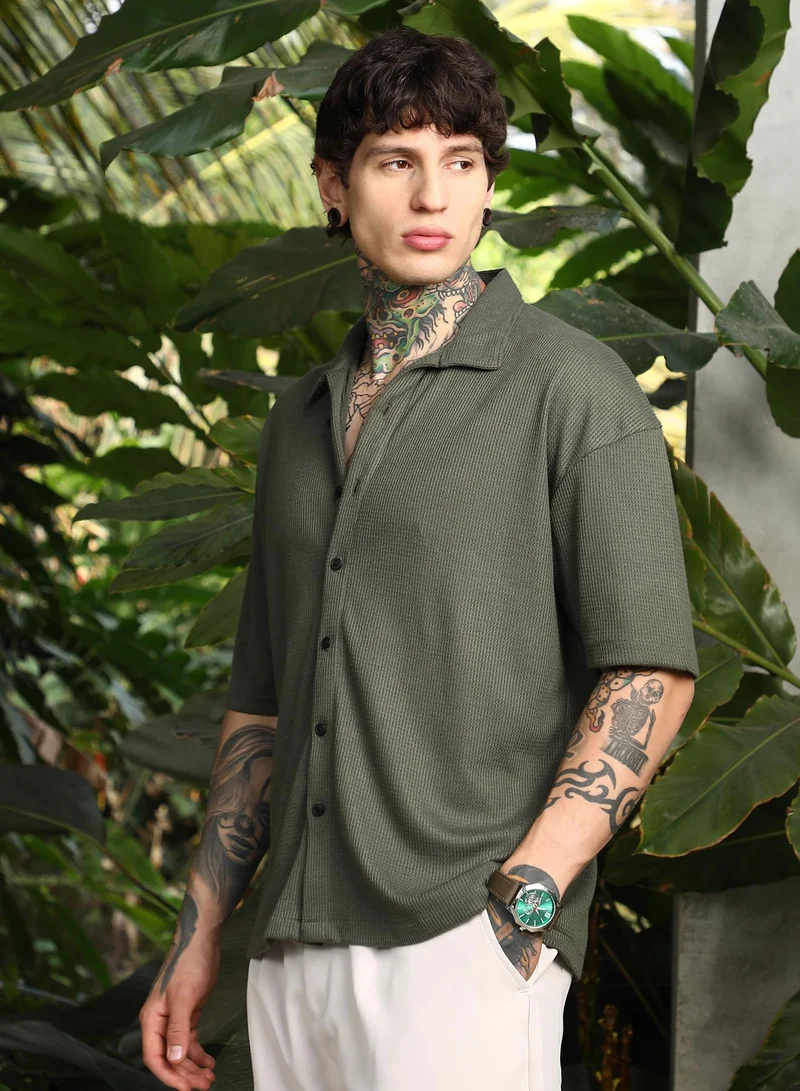 Campus Sutra Campus Sutra Men's Seaweed Green Waffle-Knit Shirt For Casual Wear | Spread Collar | Short Cuffed Sleeves | Button Closure | Oversized Shirt Crafted With Comfort Fit For Everyday Wear