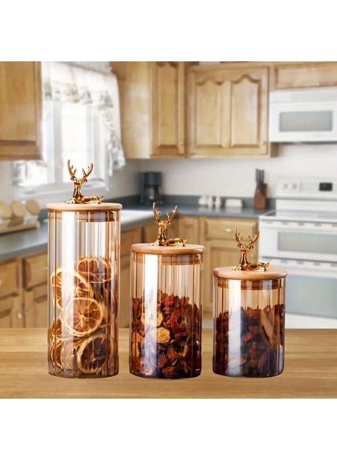 برطمانات تخزين زجاجية مزخرفة بغطاء غزال ذهبي، علب مطبخ ملونة بلون كهرماني، مجموعة من 3 قطع - Image 1