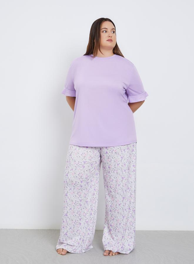 A set of ruffled T-shirts with floral printed pant...