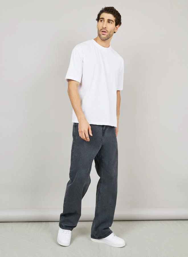 ستايلي Mid Rise Enzyme Wash Wide Leg Jeans