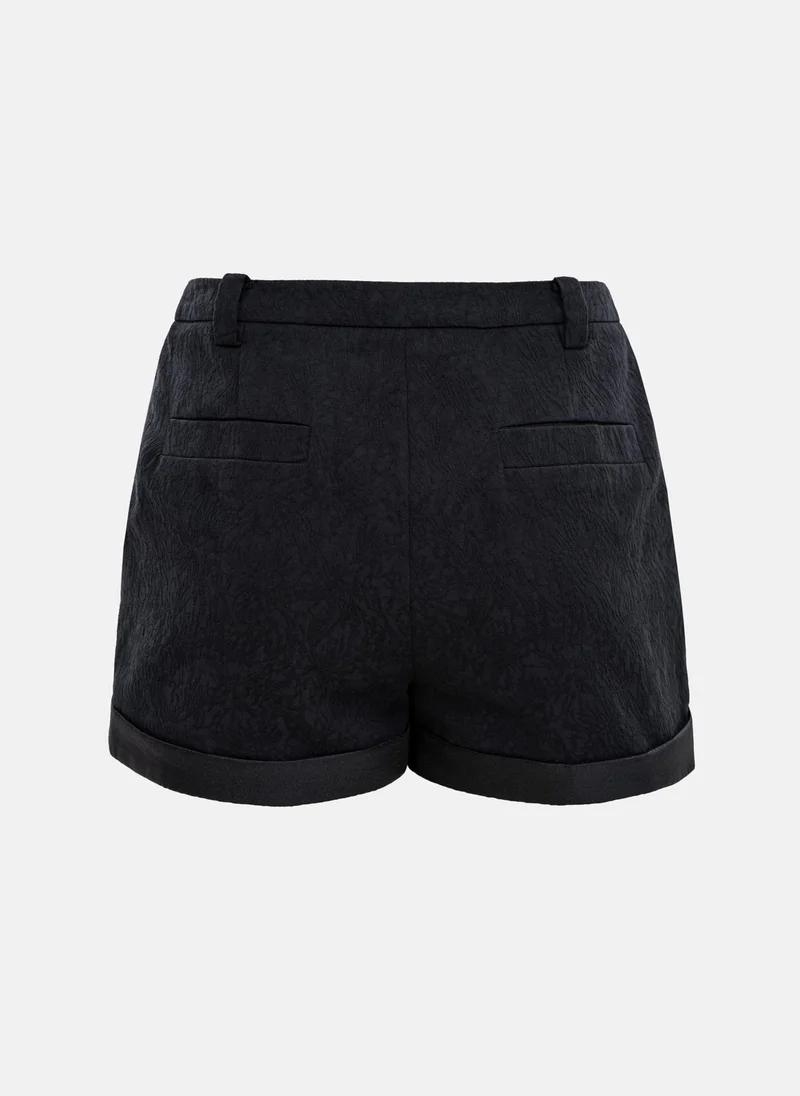 Lichi Textured mini shorts