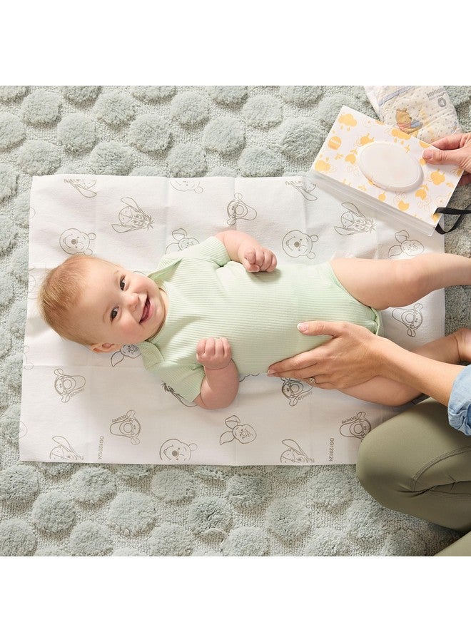 J.L. Childress Disney Baby by J.L. Childress Disposable Changing Pads for Baby - Diaper Changing Table Covers, Travel Essentials for Babies, Absorbent Liner Pads, Leak-Resistant, 26"x18" - Winnie The Pooh, 24 Count - Image 5
