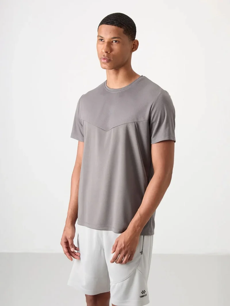 تومي لايف TOMMY Men's Solid Polyester Crew Neck T-Shirt