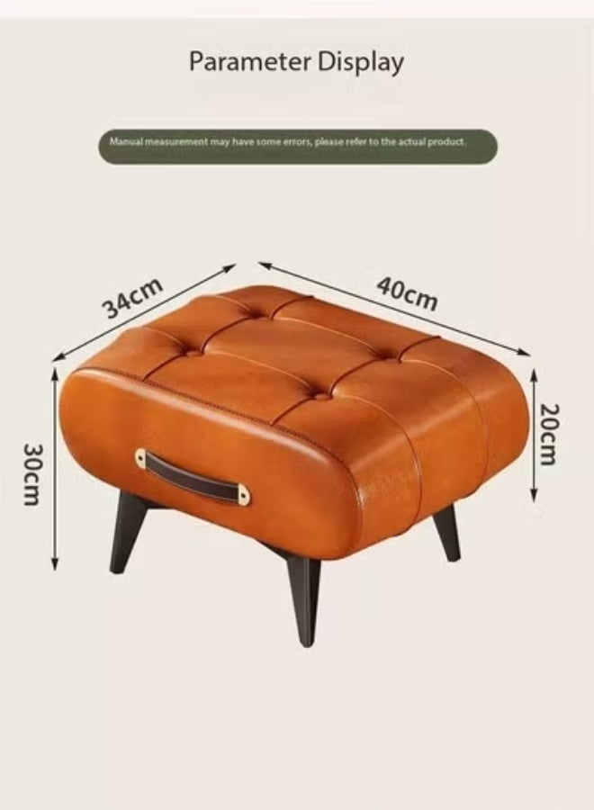 Raffine Mid-Century Modern Tufted Leather Ottoman Featuring Rich Cognac Upholstery, Decorative Side Handle Accent, and Angled Wooden Legs for Versatile Use as a Footrest, Accent Stool, or Compact Seating in Stylish Living Spaces 40 x 34 x 30 cm. - Image 4