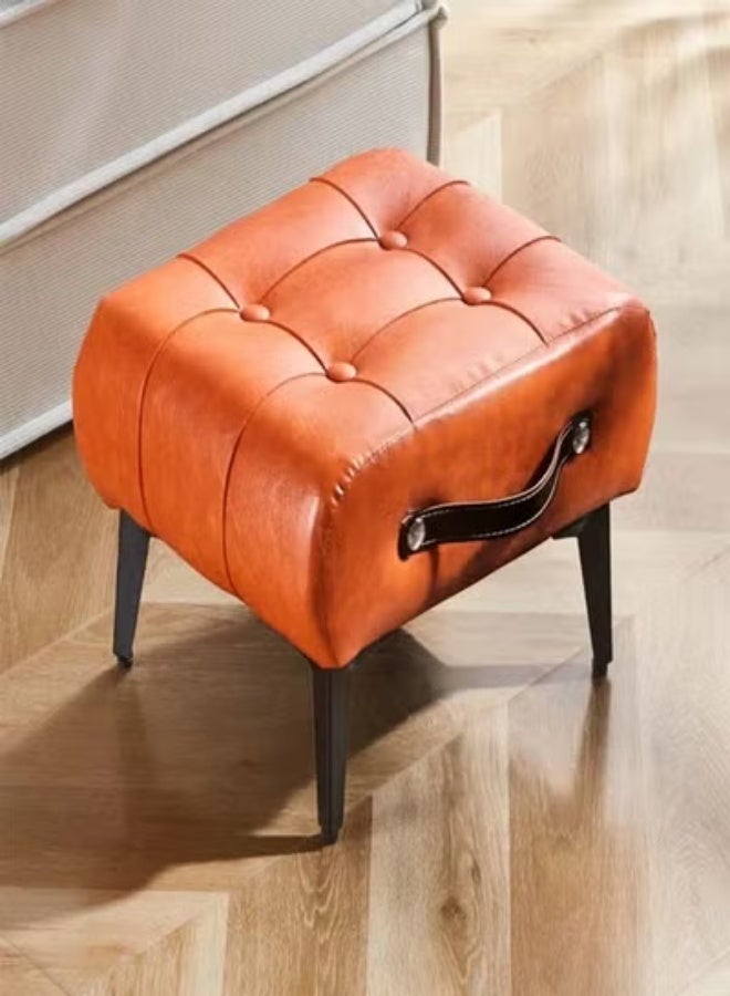 Raffine Mid-Century Modern Tufted Leather Ottoman Featuring Rich Cognac Upholstery, Decorative Side Handle Accent, and Angled Wooden Legs for Versatile Use as a Footrest, Accent Stool, or Compact Seating in Stylish Living Spaces 40 x 34 x 30 cm. - Image 5