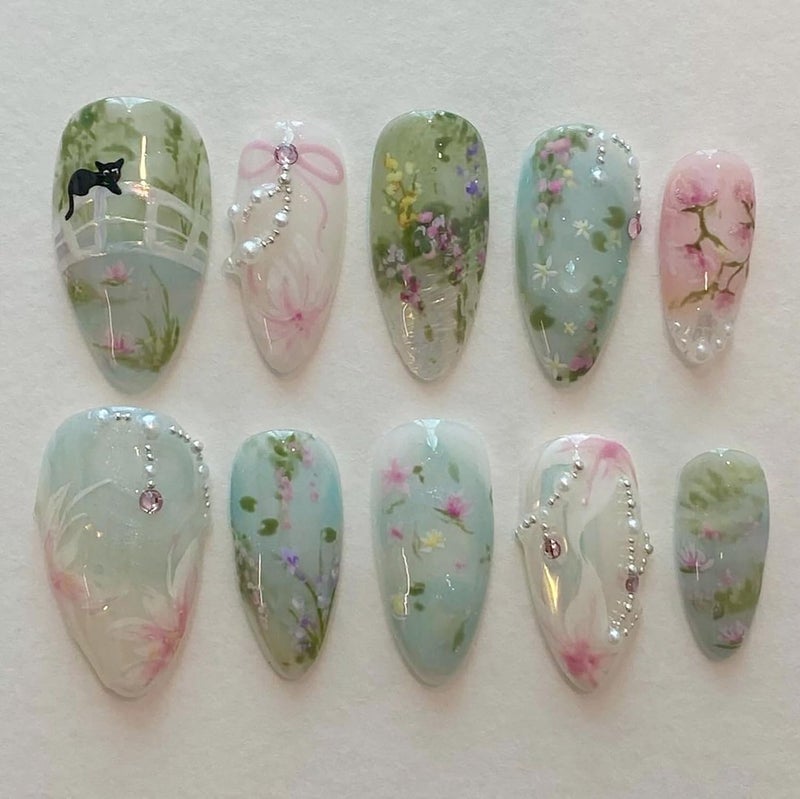 KRTBKR 24Pcs Handmade Press on Nails Medium Almond Fake Nails Green Pink Flower Cute Cat Full Cover Glue on Nails Rhinestones Charms Glitter Designs Spring Summer False Nails for Women Girls Acrylic Nails - Image 1