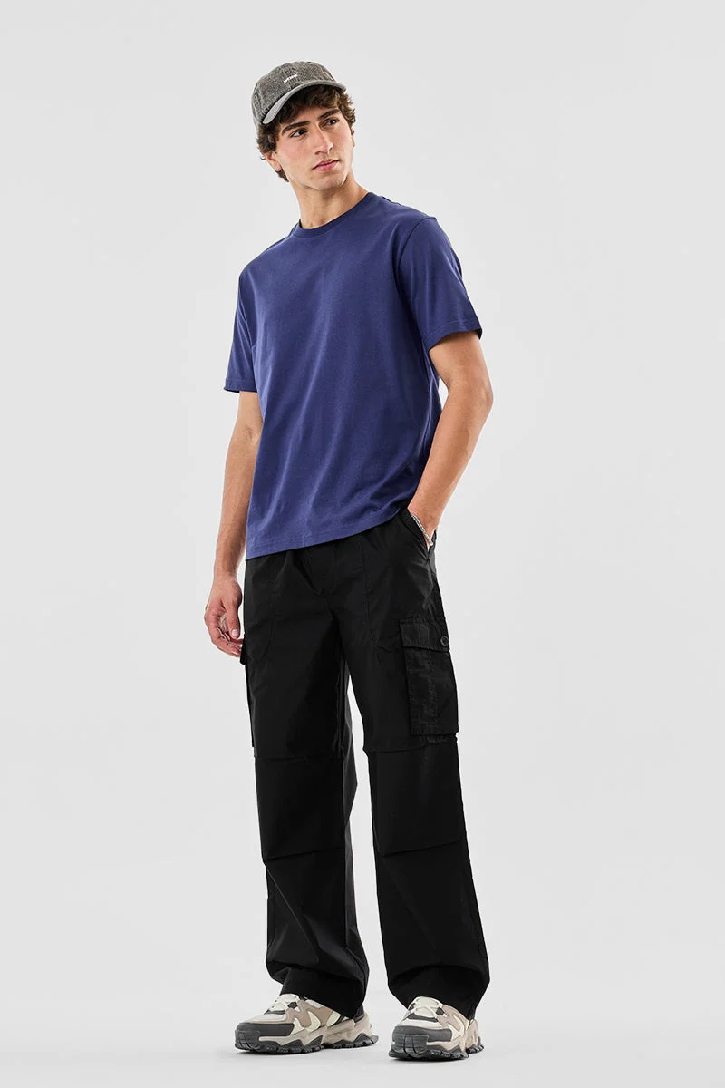 SNITCH بنطلون كارجو بخصر مطاطي وستة جيوب