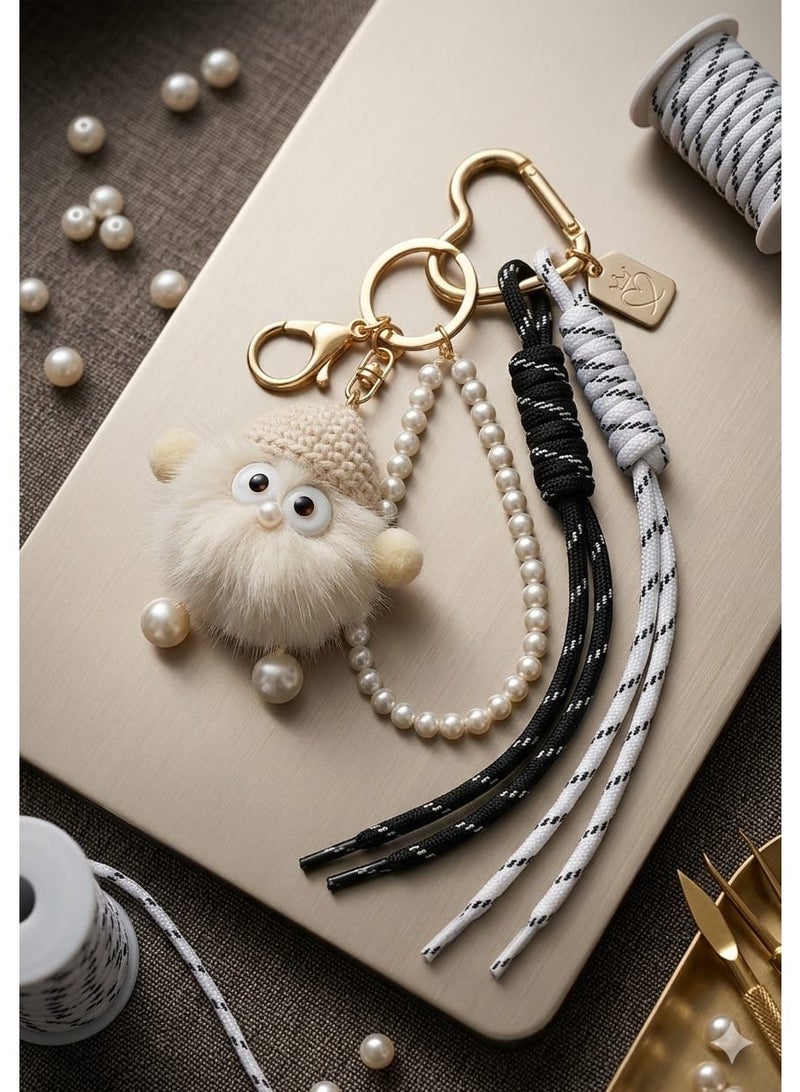Cute bag charm with a soft plush toy – versatile keychain with strings and pearl embellishments – stylish accessory for bags, keys, and gifts - Image 1