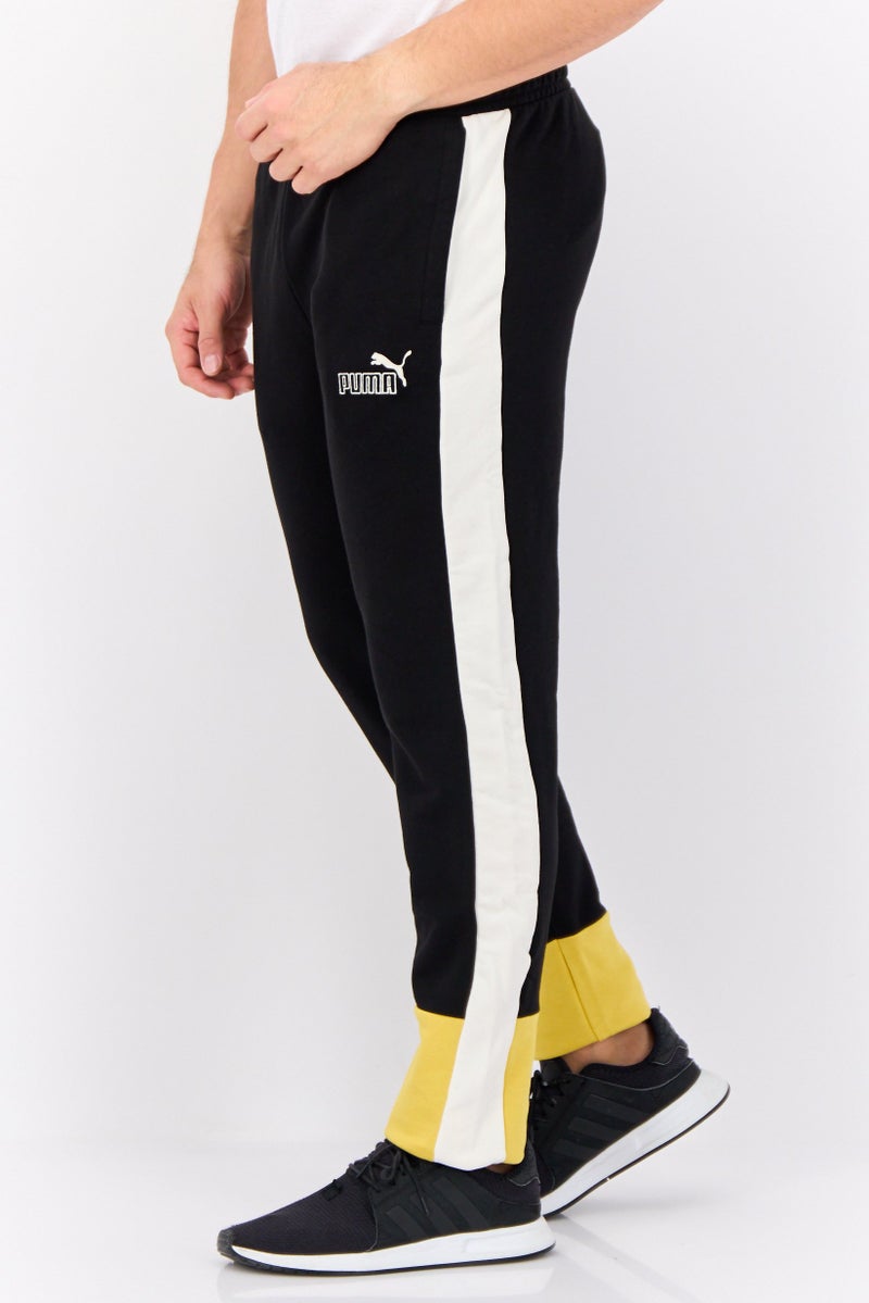 PUMA سروال تدريب ضيق للرجال مع شعار مطرز، أسود - Image 2
