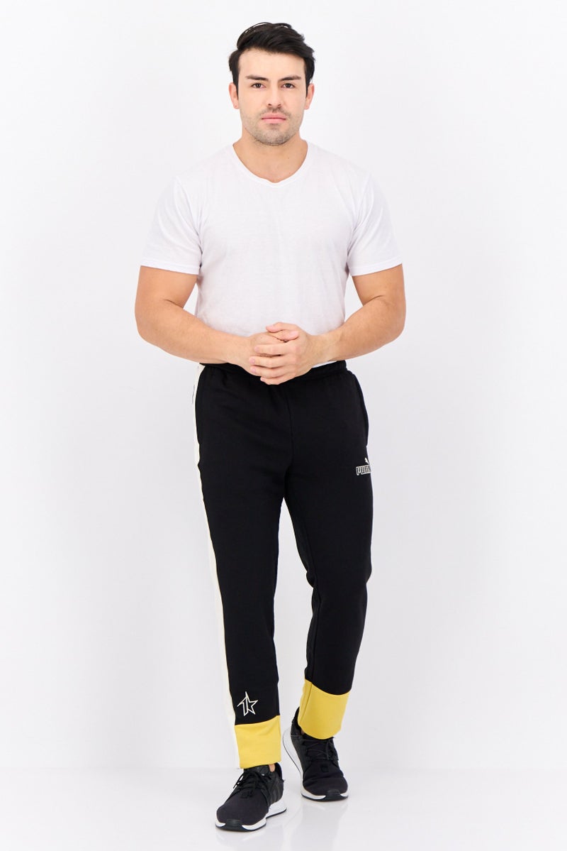 PUMA سروال تدريب ضيق للرجال مع شعار مطرز، أسود - Image 3