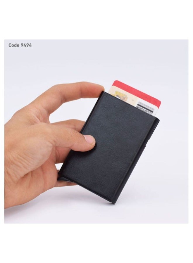 A credit card holder wallet with RFID protection; with a single click, it slides out 6 cards. - Image 1