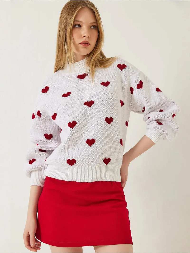 بيانكو لوتشي كنزة بياقة مستديرة بنقشة قلب من لوكسي