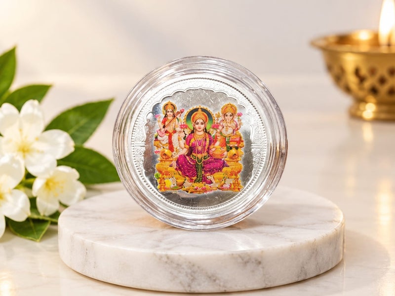 KHUSHBOO JEWELS 5G 999 FINE PURE SILVER LAKSHMI GANESHA SARASWATI COLOURED COIN - Image 1