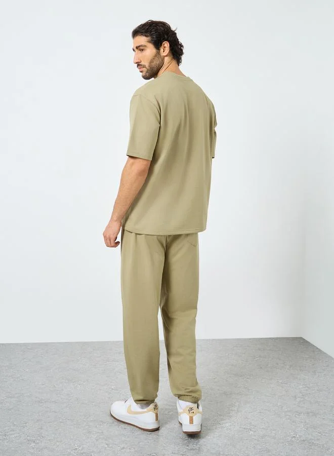 Styli Styli Badge Oversized T-Shirt and Elasticated Joggers Co-Ords