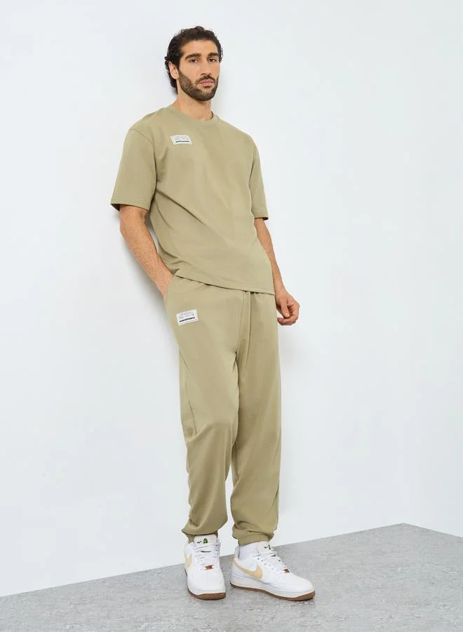 Styli Styli Badge Oversized T-Shirt and Elasticated Joggers Co-Ords