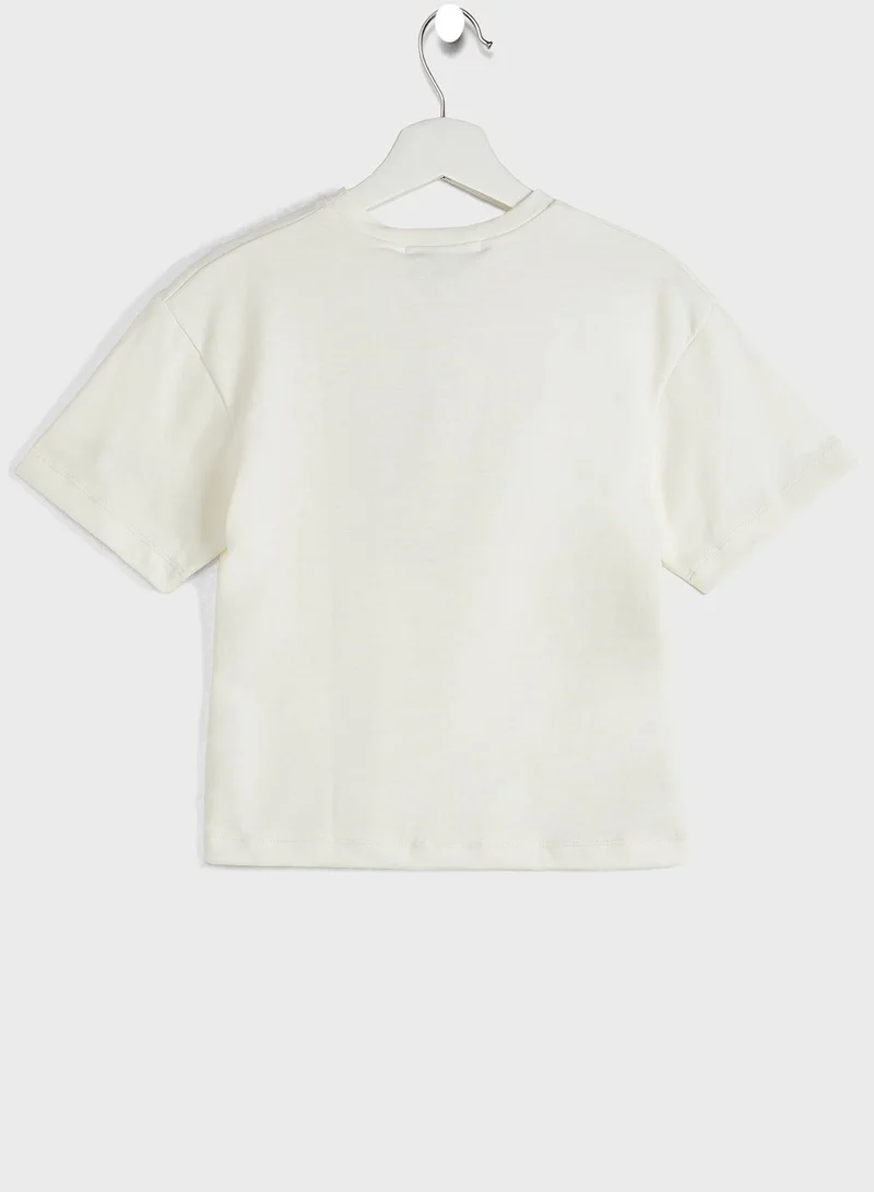 ذا جيفينج موفمنت تيشيرت فضفاض