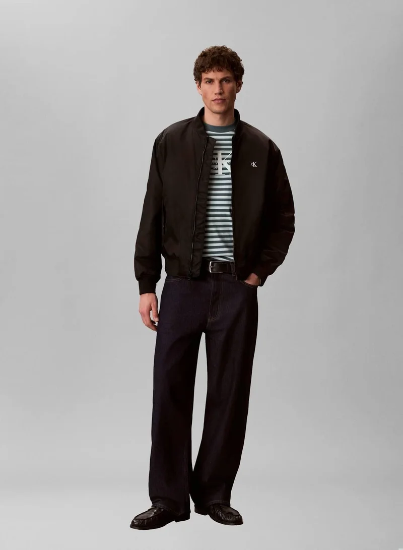 Calvin Klein Jeans Turbulence Monogram Logo Stripe Relaxed T-Shirt for Men | Best Price UAE