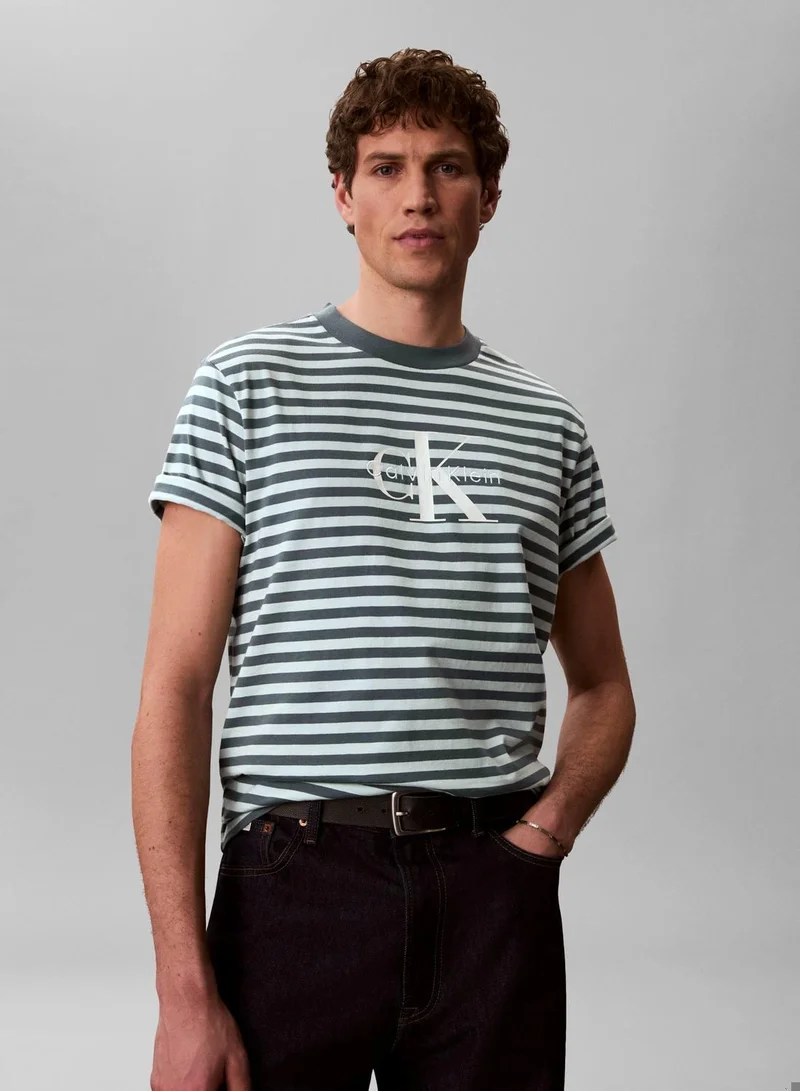 Calvin Klein Jeans Turbulence Monogram Logo Stripe Relaxed T-Shirt for Men | Best Price UAE