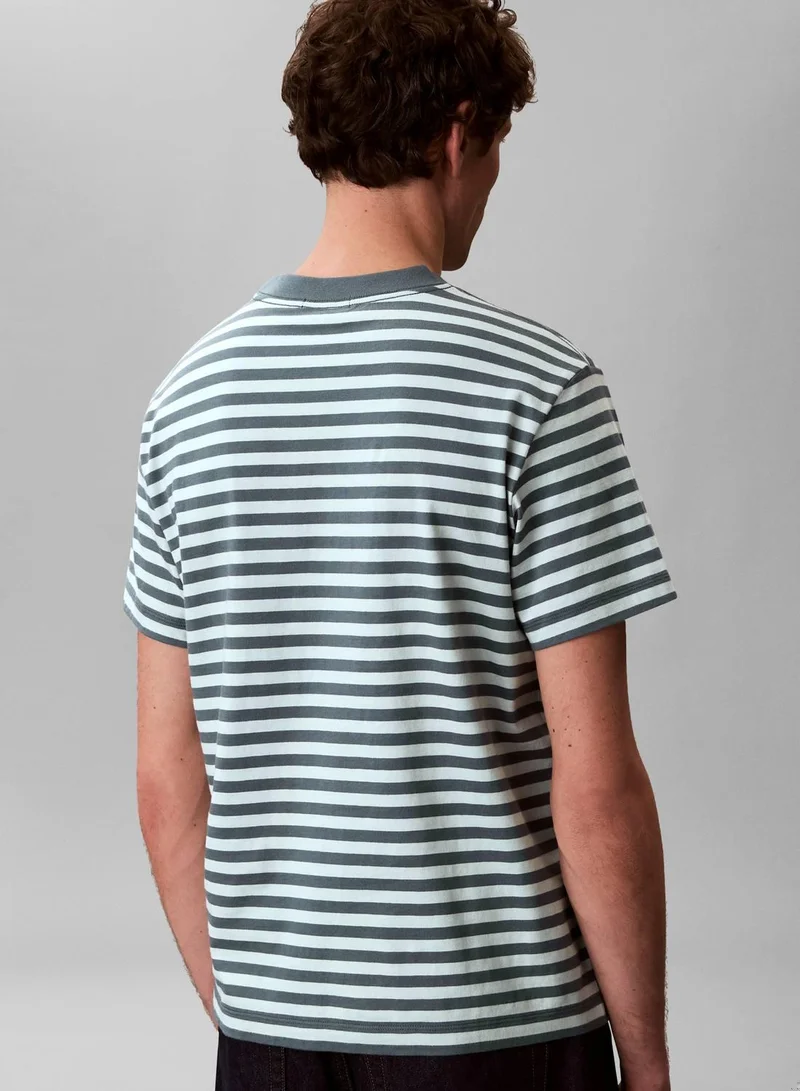 Calvin Klein Jeans Turbulence Monogram Logo Stripe Relaxed T-Shirt for Men | Best Price UAE