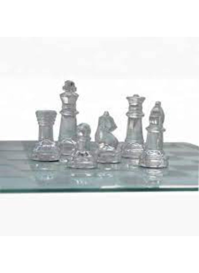 null - Elevate your gameplay with the International Glass Chess Set, a blend of elegance and sophistication. Perfect for chess enthusiasts, it also serves as a luxurious decorative piece or an exceptional gift for any occasion. - Image 1