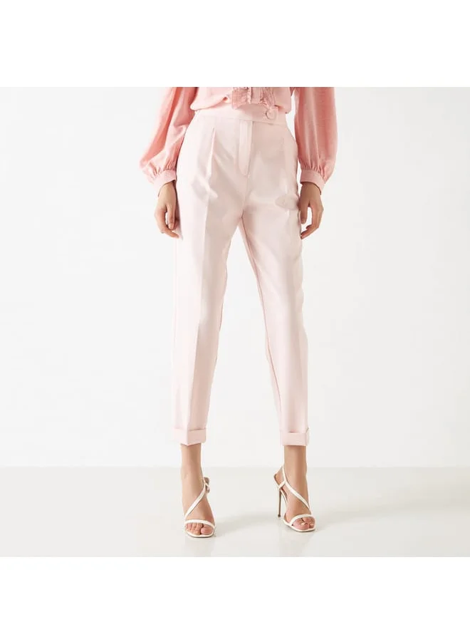 Iconic Solid Tapered Pants with Button Accent and Pockets
