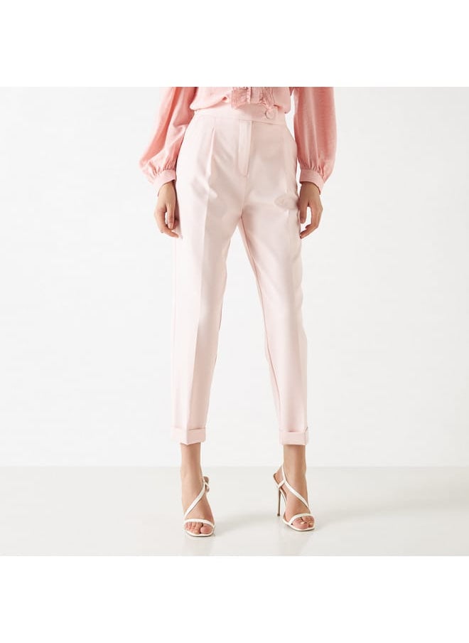 Iconic Solid Tapered Pants with Button Accent and Pockets  - Image 1