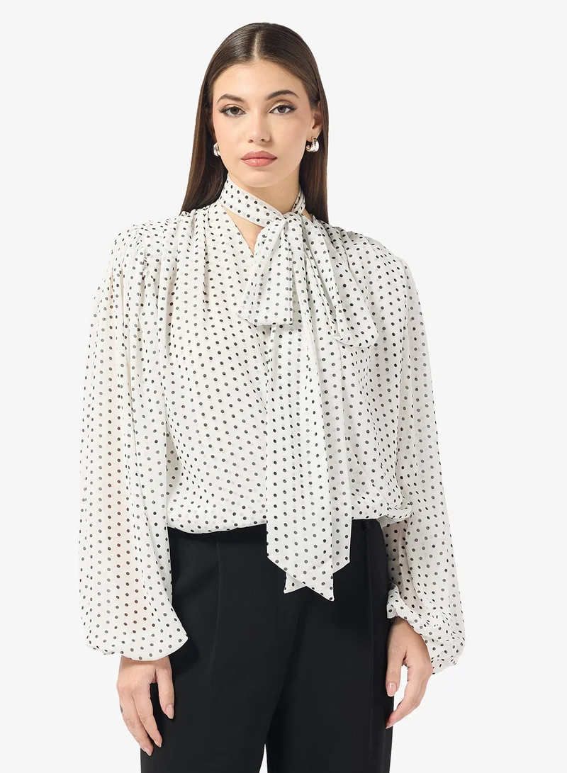 ايلا بلوزة بطبعة منقطة