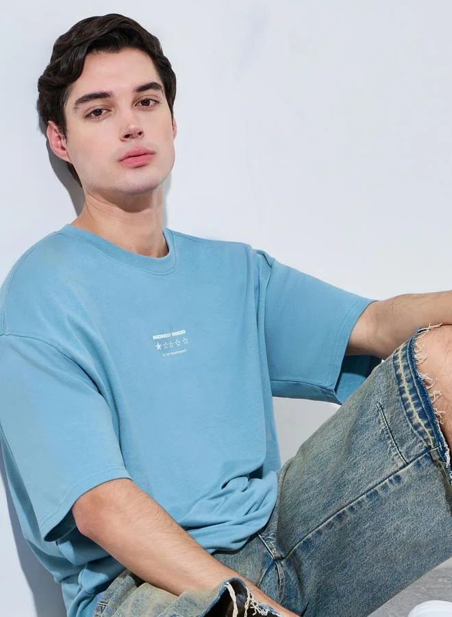 Styli Blue Men Oversized Text Print Terry T-Shirt for Men | Best Price UAE