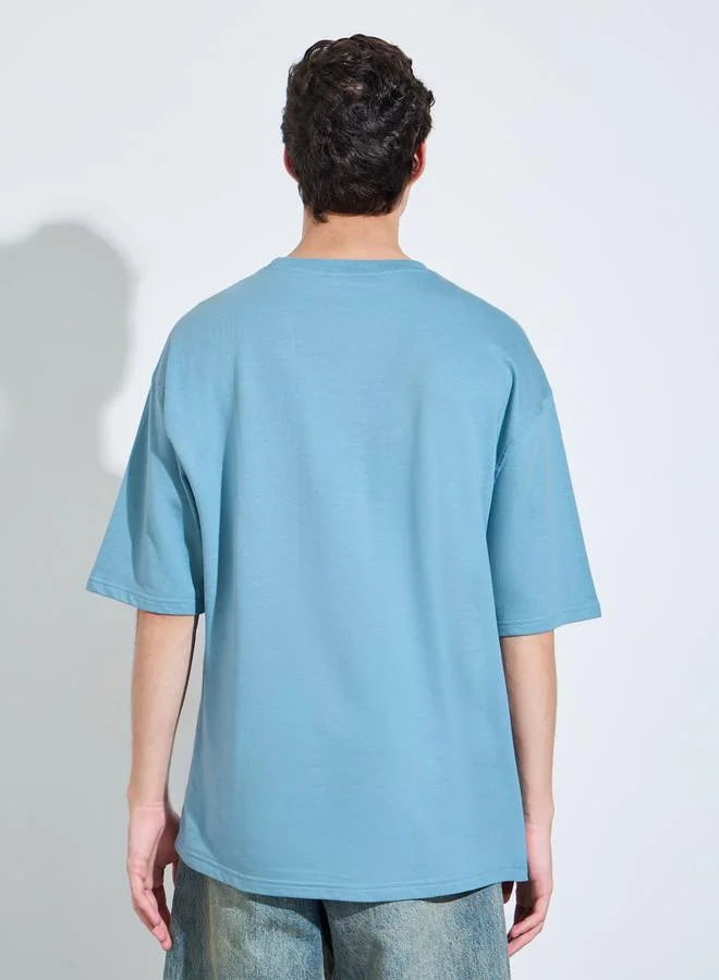 Styli Blue Men Oversized Text Print Terry T-Shirt for Men | Best Price UAE