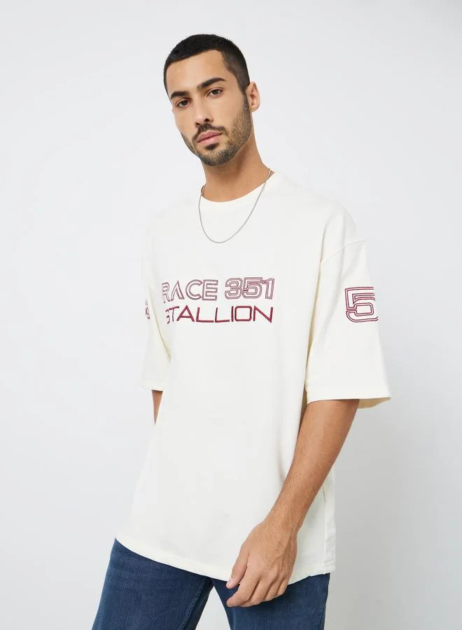 Styli Men Beige Graphic Print Boxy Fit T-Shirt