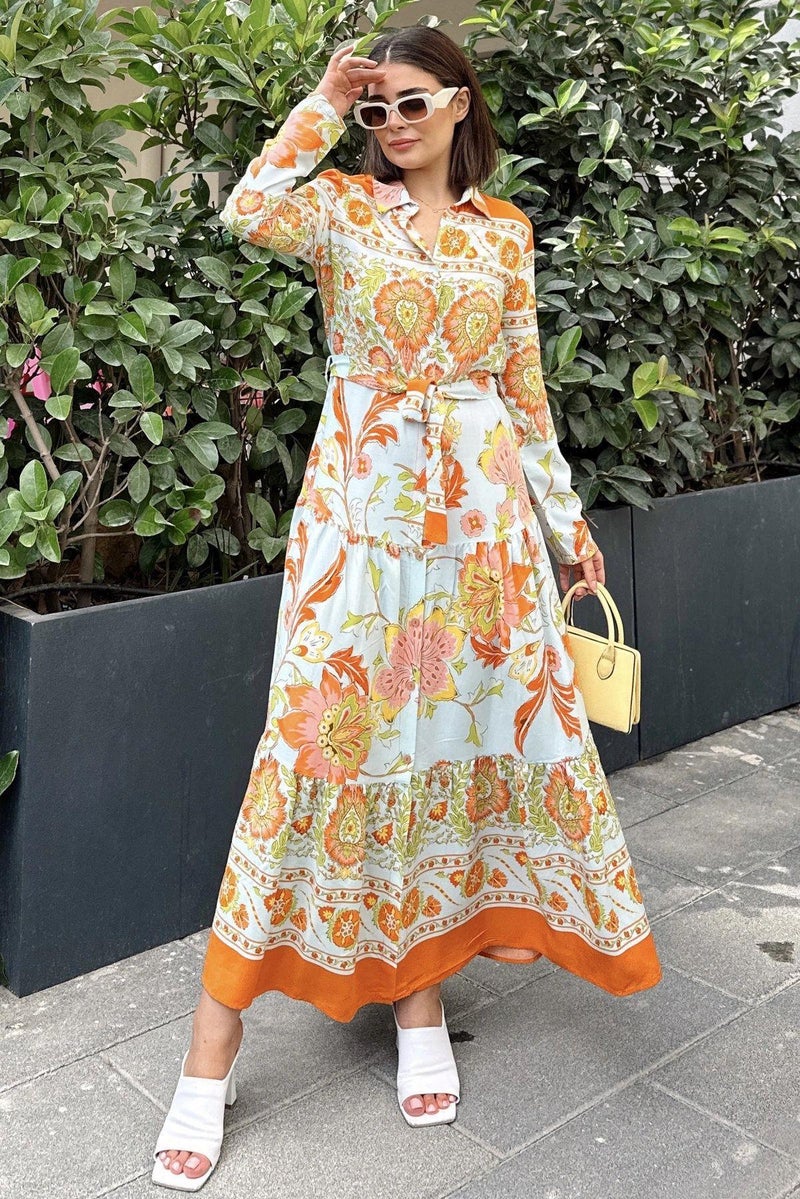 Weshaya فستان نسائي برتقالي - Image 1