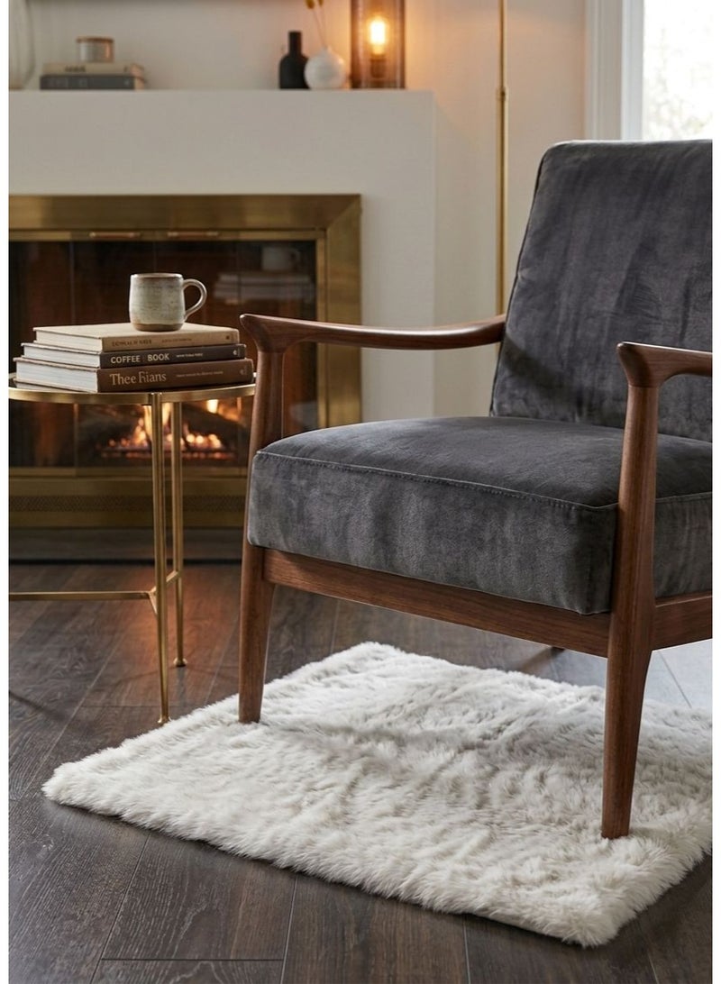 High‑quality fur small rug with a luxurious soft feel Made from ultra‑plush fibers for maximum comfort Non‑slip backing keeps the rug firmly in place Anti‑allergic material safe for sensitive skin Durable construction that stays fluffy and elegant Perfect for bedrooms, living rooms, and cozy corners - Image 1