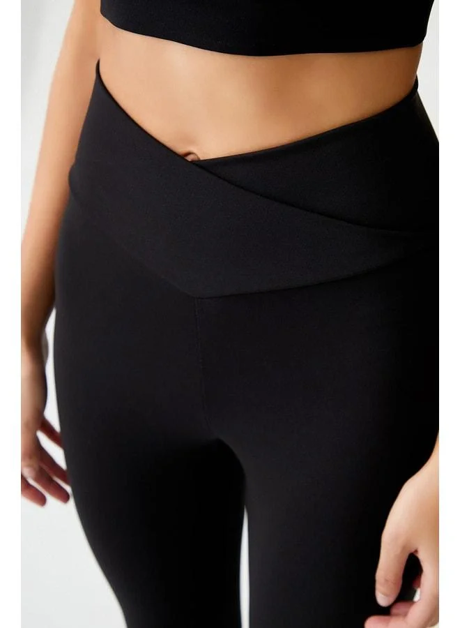 Los Ojos Black Cross Waist Detail Envelope Legging.