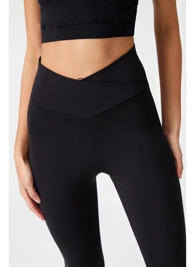 Los Ojos Black Cross Waist Detail Envelope Legging.
