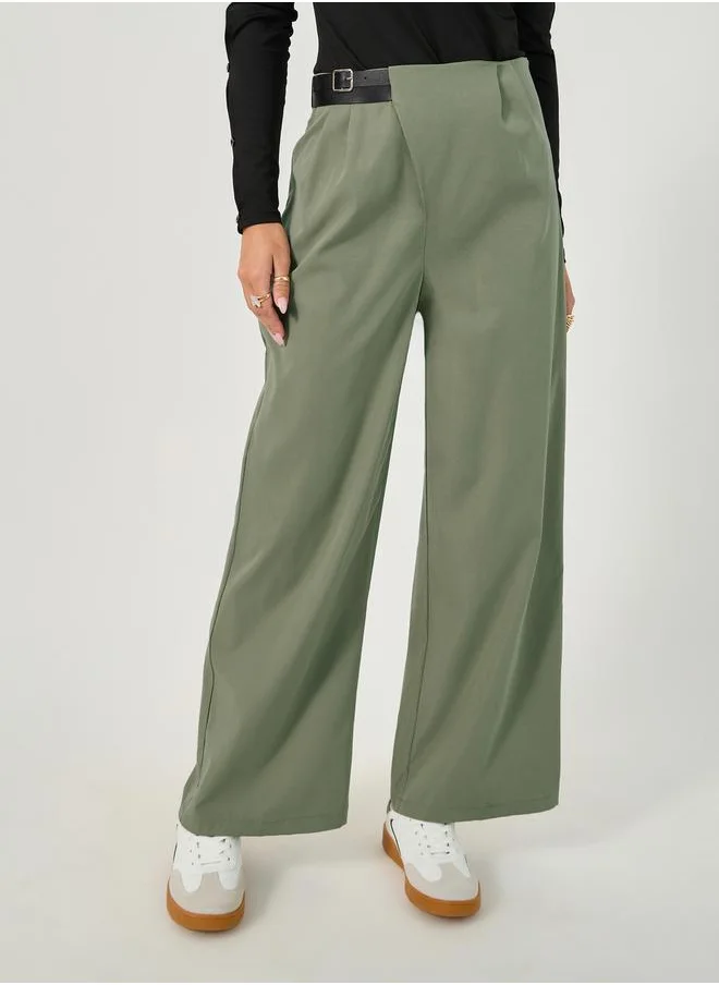 ستايلي Straight Fit Mid Rise Cross Panel Pants with Belt