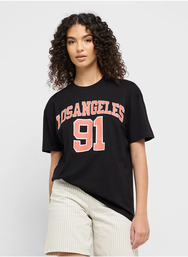 جينجر Crew Neck Varsity T-Shirt
